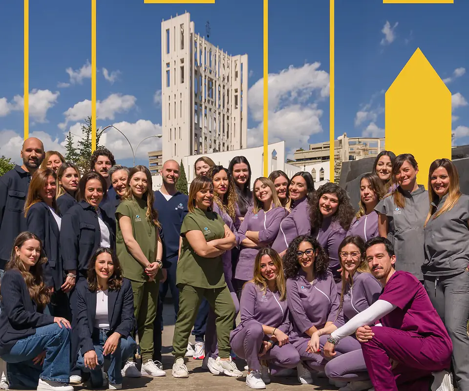 The team of Studio Dentistico Conte in front of the Co-cathedral of Taranto
